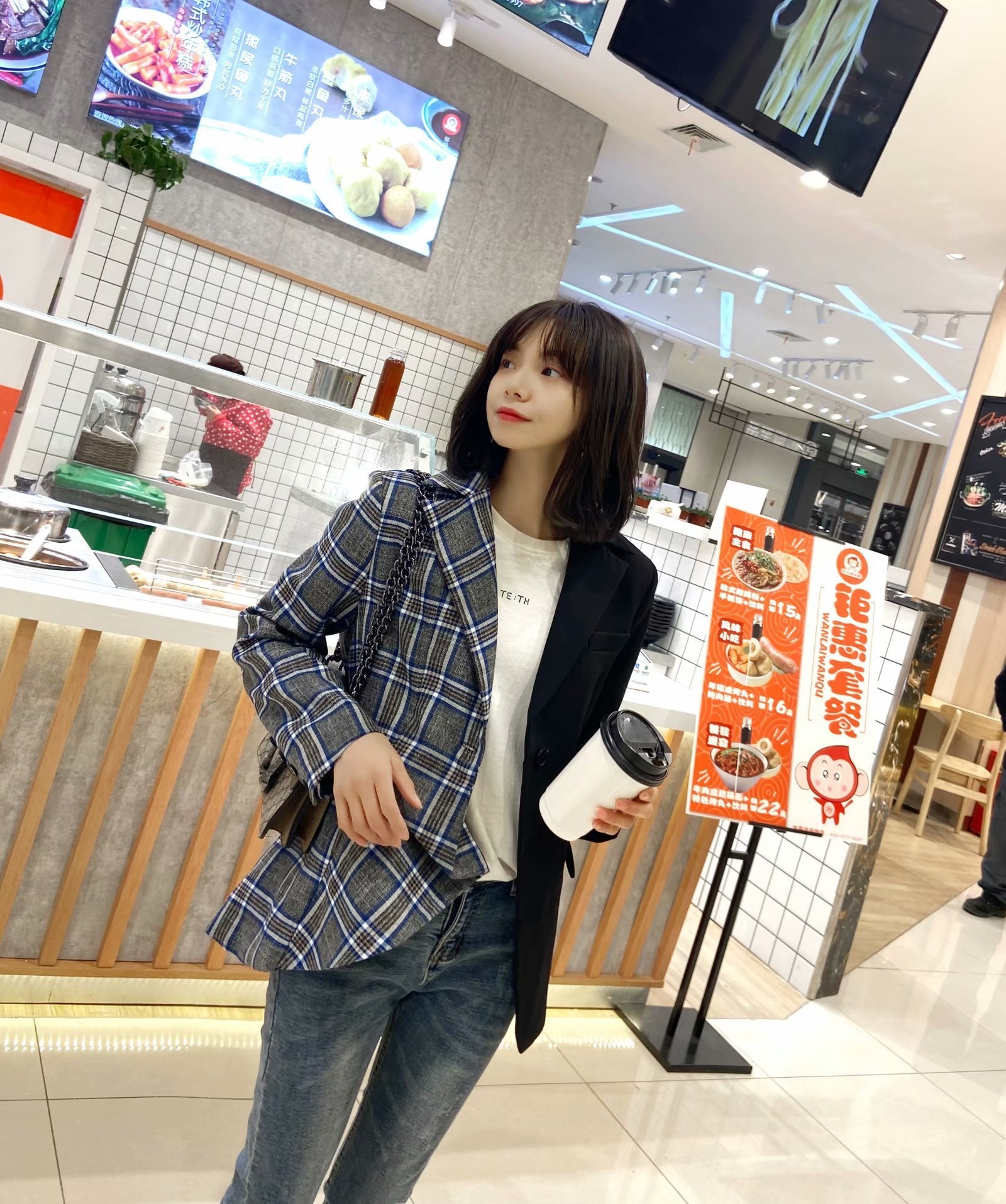 Button-stitched check suit